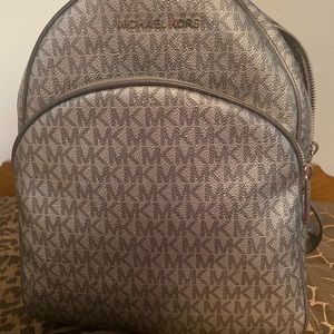 Michael Kors metallic backpack purse